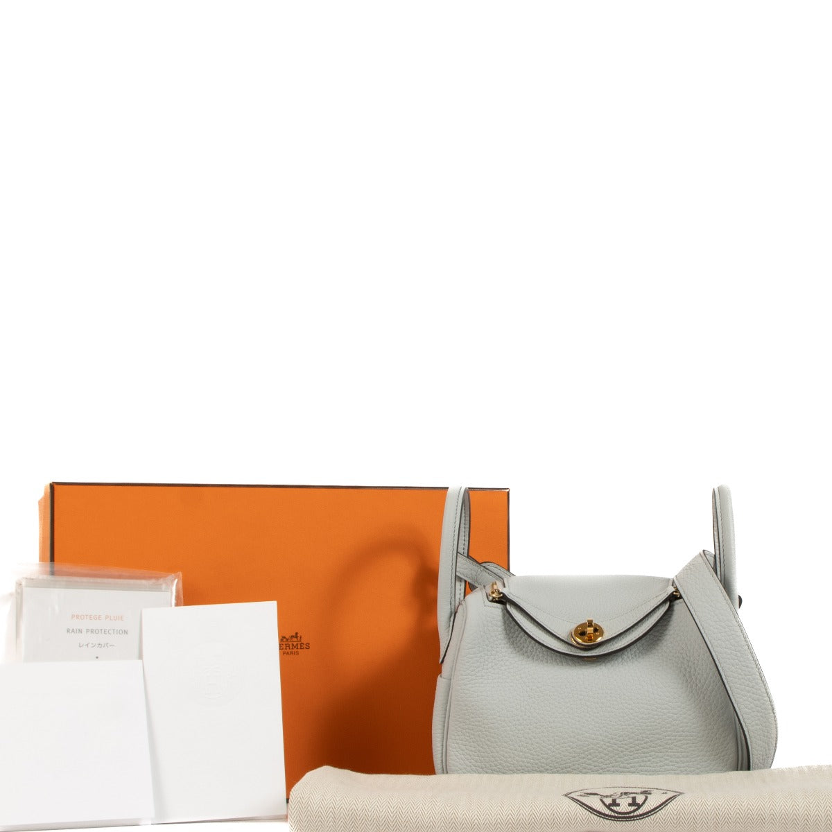 Authentic second hand Hermès Lindy Mini Bleu Pale Taurillon Clemence on www.labellov.com