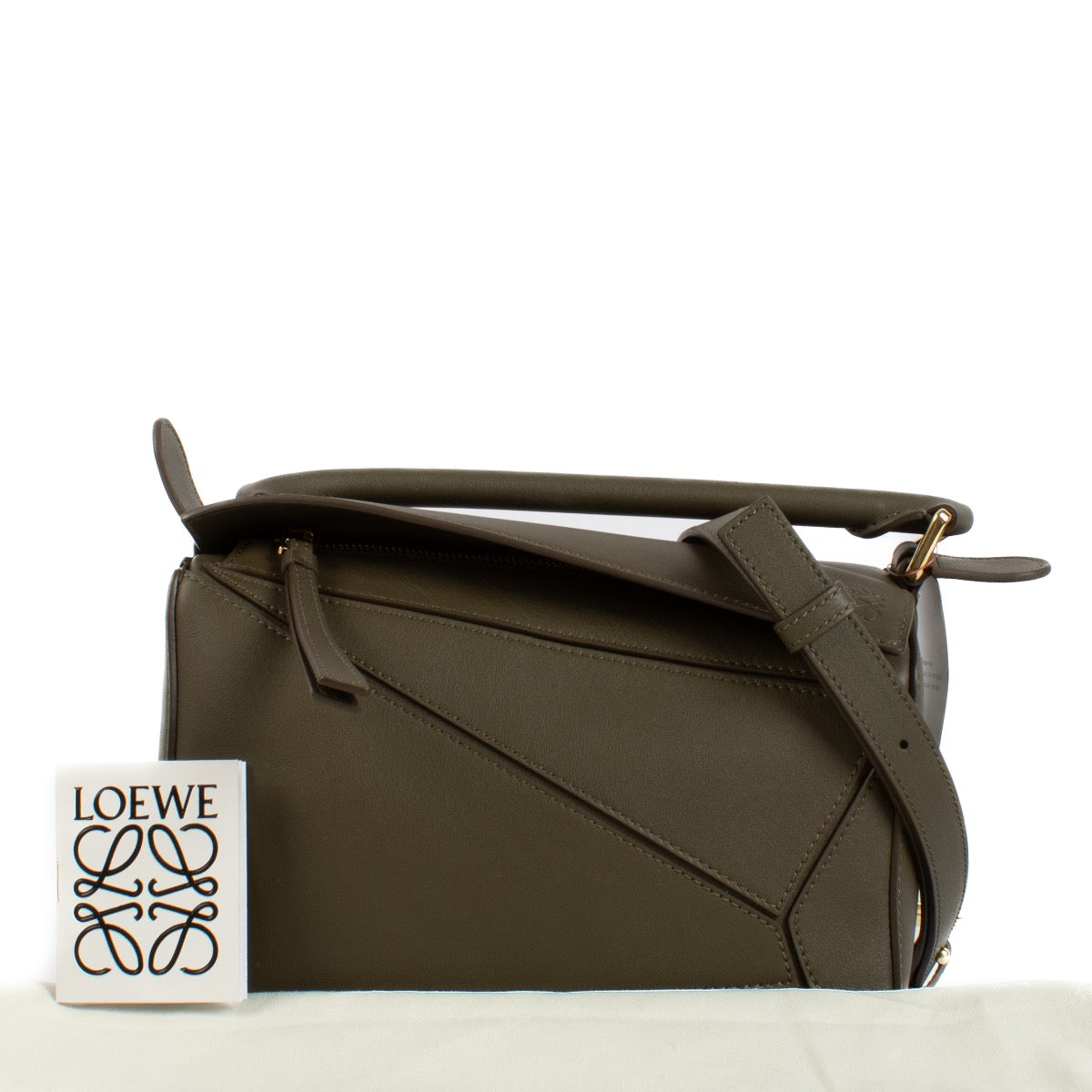 Shop safe online at Labellov in Antwerp and Knokke this 100% authentic second hand Loewe Khaki Calfskin Puzzle Edge Small Hand Bag