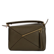 Shop safe online at Labellov in Antwerp and Knokke this 100% authentic second hand Loewe Khaki Calfskin Puzzle Edge Small Hand Bag