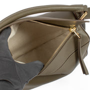 Shop safe online at Labellov in Antwerp and Knokke this 100% authentic second hand Loewe Khaki Calfskin Puzzle Edge Small Hand Bag