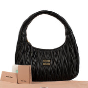 Shop safe online at Labellov in Antwerp and Knokke this 100% authentic second hand Miu Miu Black Nappa Matelasse Wander Hobo Bag