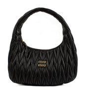 Shop safe online at Labellov in Antwerp and Knokke this 100% authentic second hand Miu Miu Black Nappa Matelasse Wander Hobo Bag