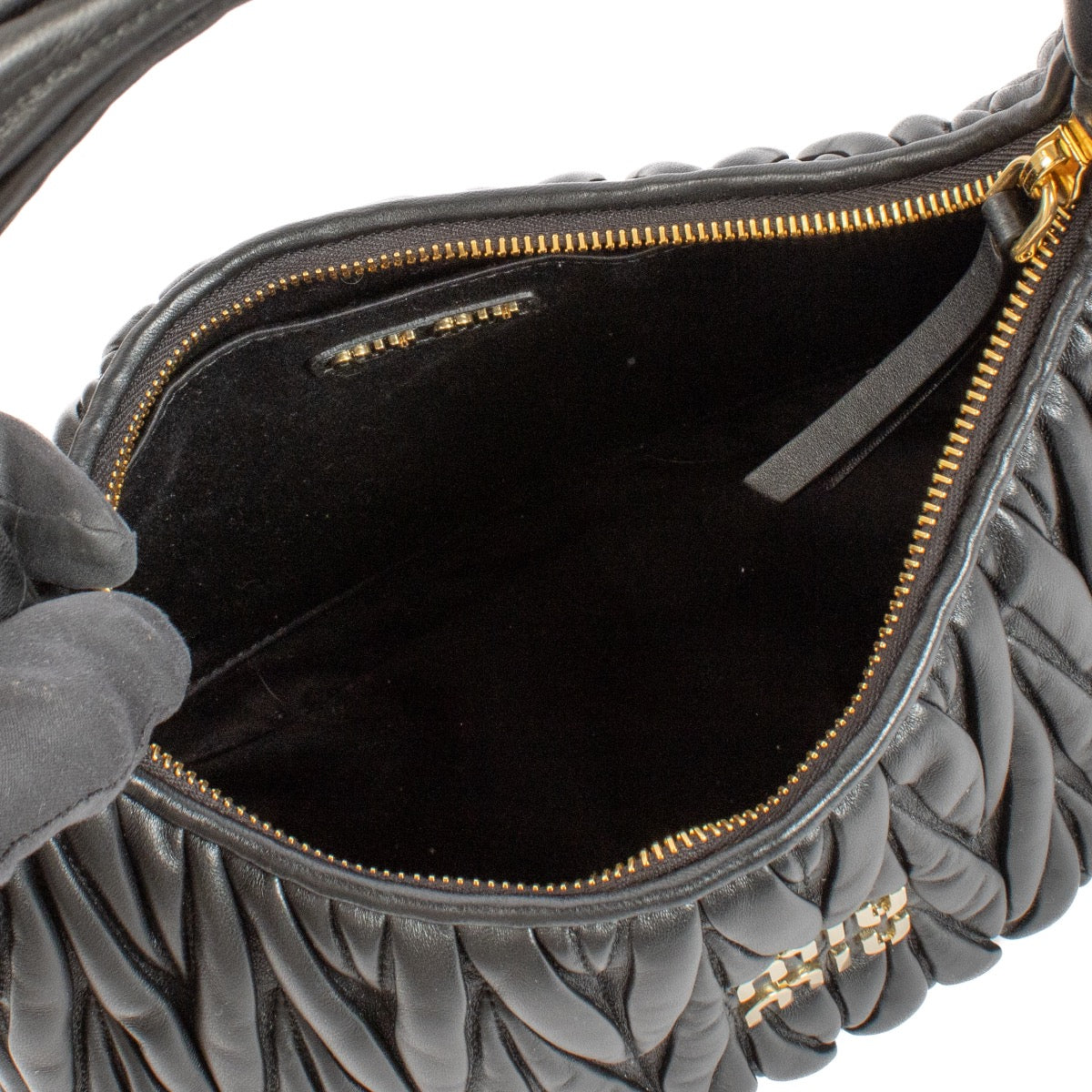 Shop safe online at Labellov in Antwerp and Knokke this 100% authentic second hand Miu Miu Black Nappa Matelasse Wander Hobo Bag