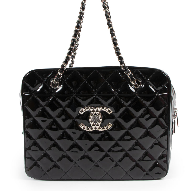 Are you looking for an authentic designer Chanel Black Quilted Patent Leather Shoulder Bag?