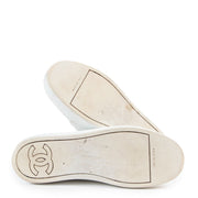 Buy authentic second hand luxury designer Chanel 17P White Rubber And Leather CC Lace Up Sneakers at Labellov.