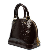 Shop safe online at Labellov in Antwerp, Brussels and Knokke this 100% authentic second hand Louis Vuitton Amarante Monogram Vernis Alma BB