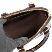 Shop safe online at Labellov in Antwerp, Brussels and Knokke this 100% authentic second hand Louis Vuitton Amarante Monogram Vernis Alma BB