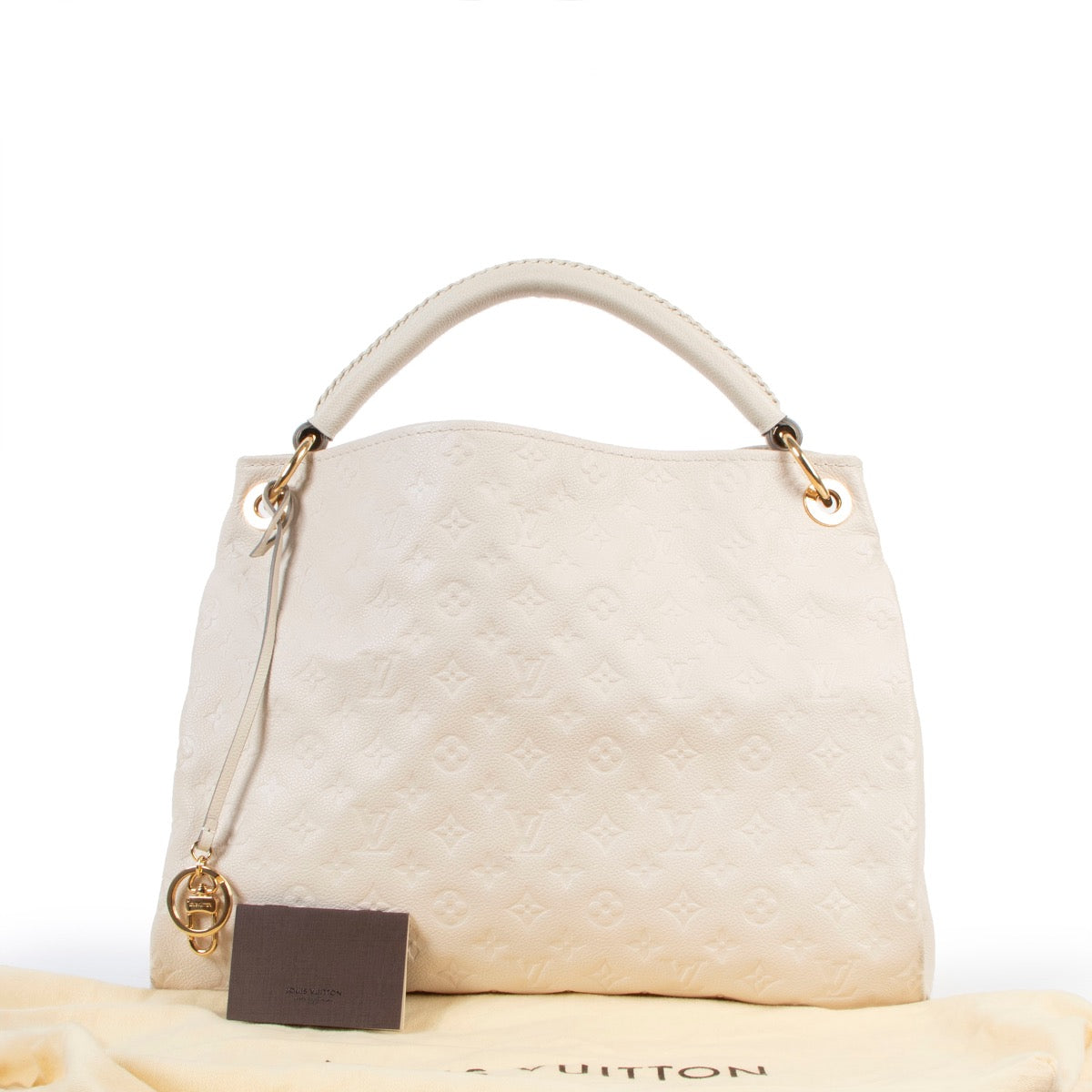 Buy an authentic second hand Louis Vuitton White Artsy MM Empreinte Monogram Shoulder Bag in very good good condition at Labellov