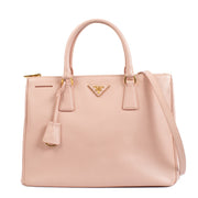 Shop safe online at Labellov in Antwerp, Brussels and Knokke this 100% authentic second hand Prada Pink Saffiano Galleria Top Handle Bag