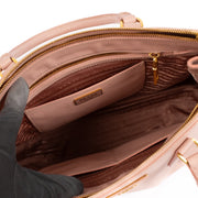 Shop safe online at Labellov in Antwerp, Brussels and Knokke this 100% authentic second hand Prada Pink Saffiano Galleria Top Handle Bag