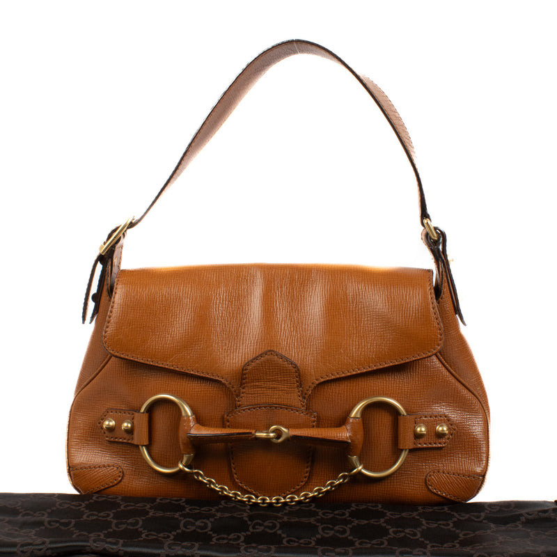 Are you looking for an authentic Gucci Camel Horsebit Shoulder Bag? We buy and sell your preloved and new designer bags for the best price.