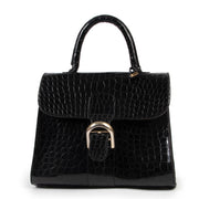 a real vintag treasure this stunning Delvaux Black Croco Brillant MM
