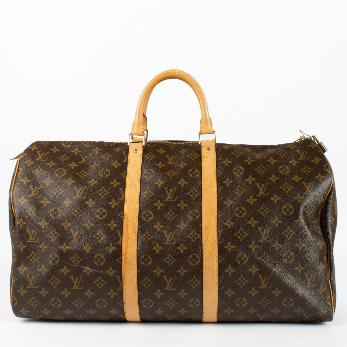 Authentic Louis Vuitton Keepall 50 in Monogram canvas with vachetta leather trim at Labellov.com