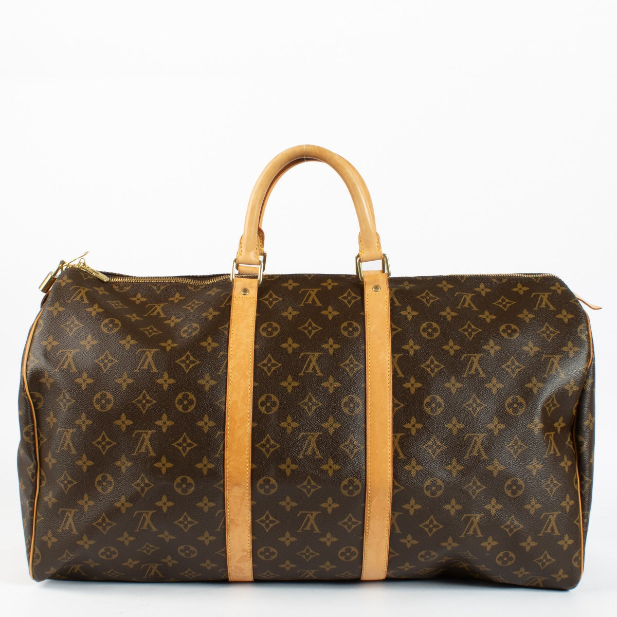 Authentic Louis Vuitton Keepall 50 in Monogram canvas with vachetta leather trim at Labellov.com