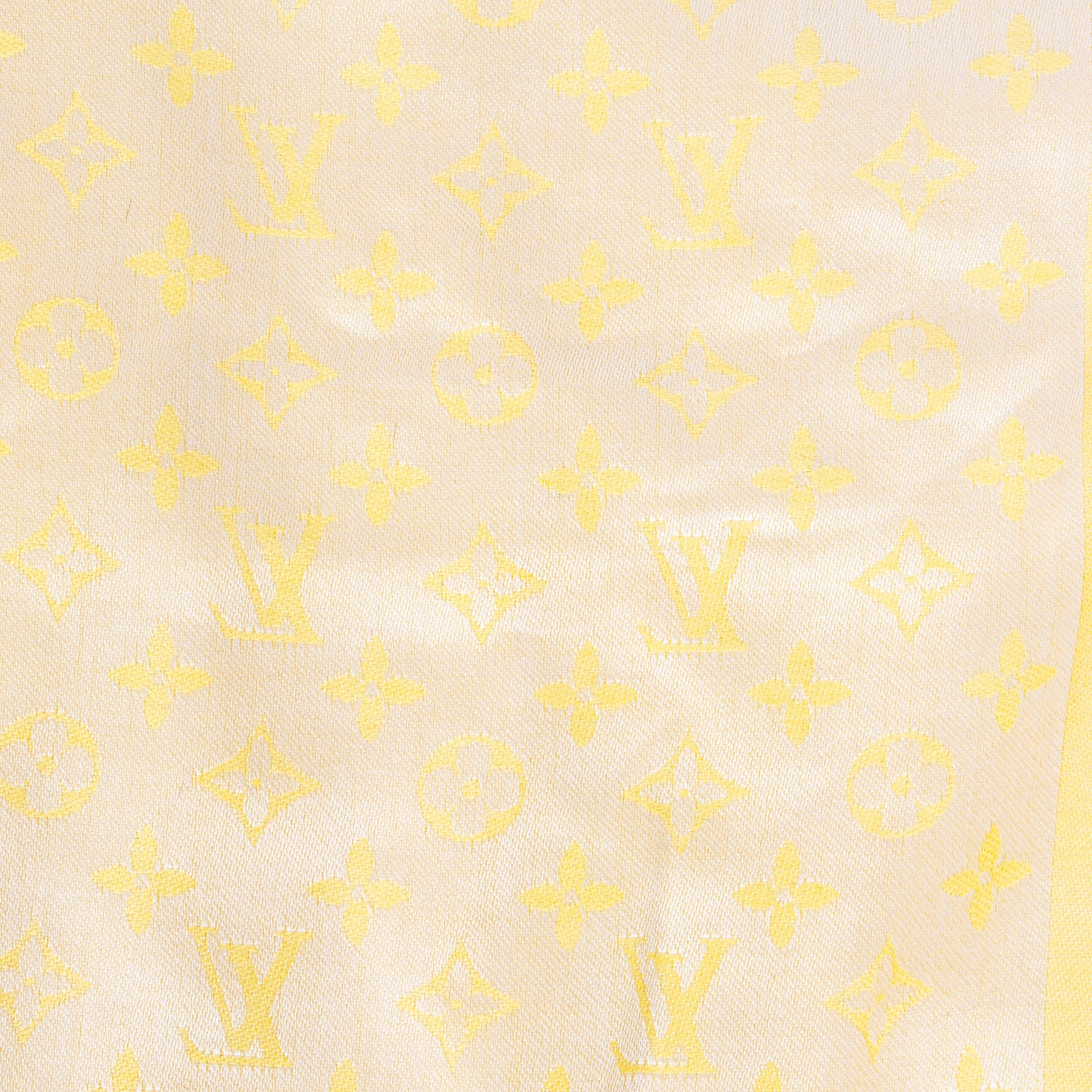 Are you looking for an authentic Louis Vuitton Yellow Monogram Scarf? Buy and sell today.