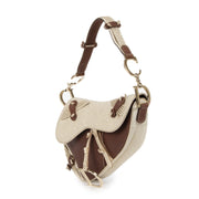 Authentic secondhand Dior Brown Leather & Gold Textile Saddle Bag designer bags designer brands fashion luxury vintage webshop saddle bag limited edition safe secure online shopping worldwide shipping delivery