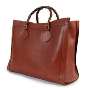 Gucci Vintage Rust Diana Leather Top Handle for the best rice at Labellov secondhand luxury in Antwerp Belgium