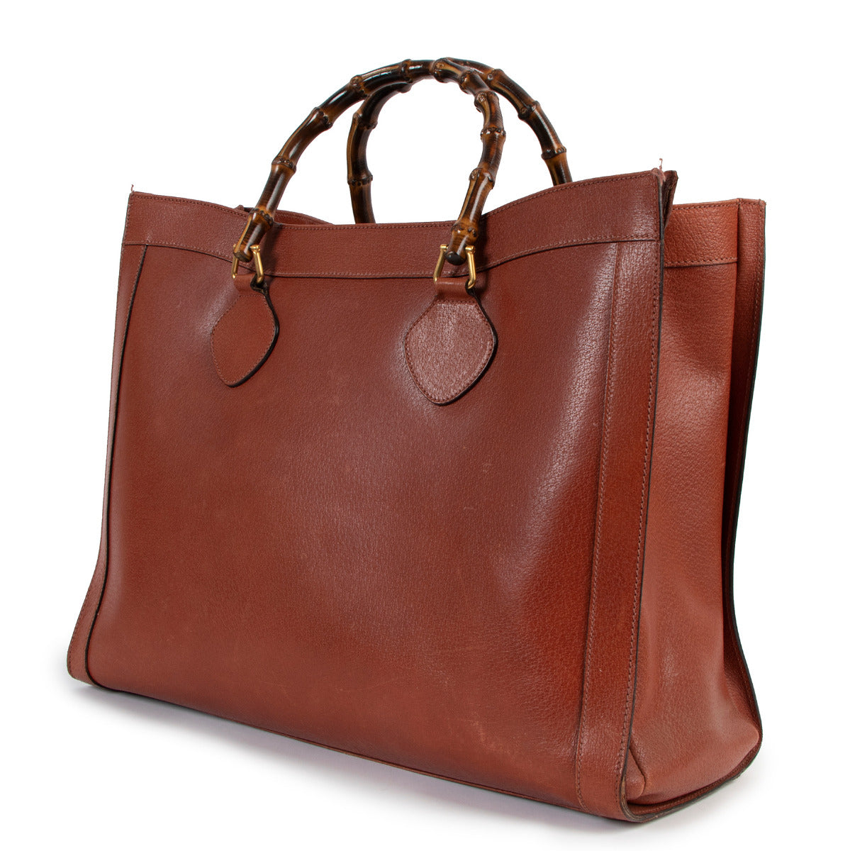 Gucci Vintage Rust Diana Leather Top Handle for the best rice at Labellov secondhand luxury in Antwerp Belgium