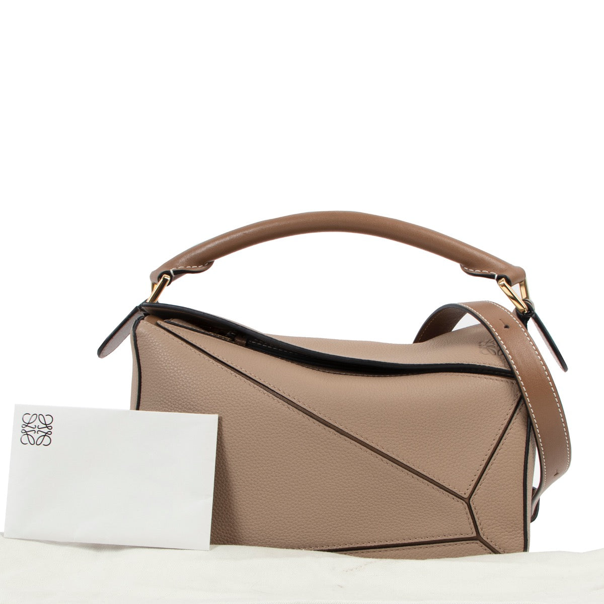 Shop now for your pre-loved, 100% authentic Loewe Beige Grained Leather Small Puzzle Top Handle bag at Labellov in Antwerp