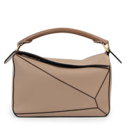 Shop now for your pre-loved, 100% authentic Loewe Beige Grained Leather Small Puzzle Top Handle bag at Labellov in Antwerp