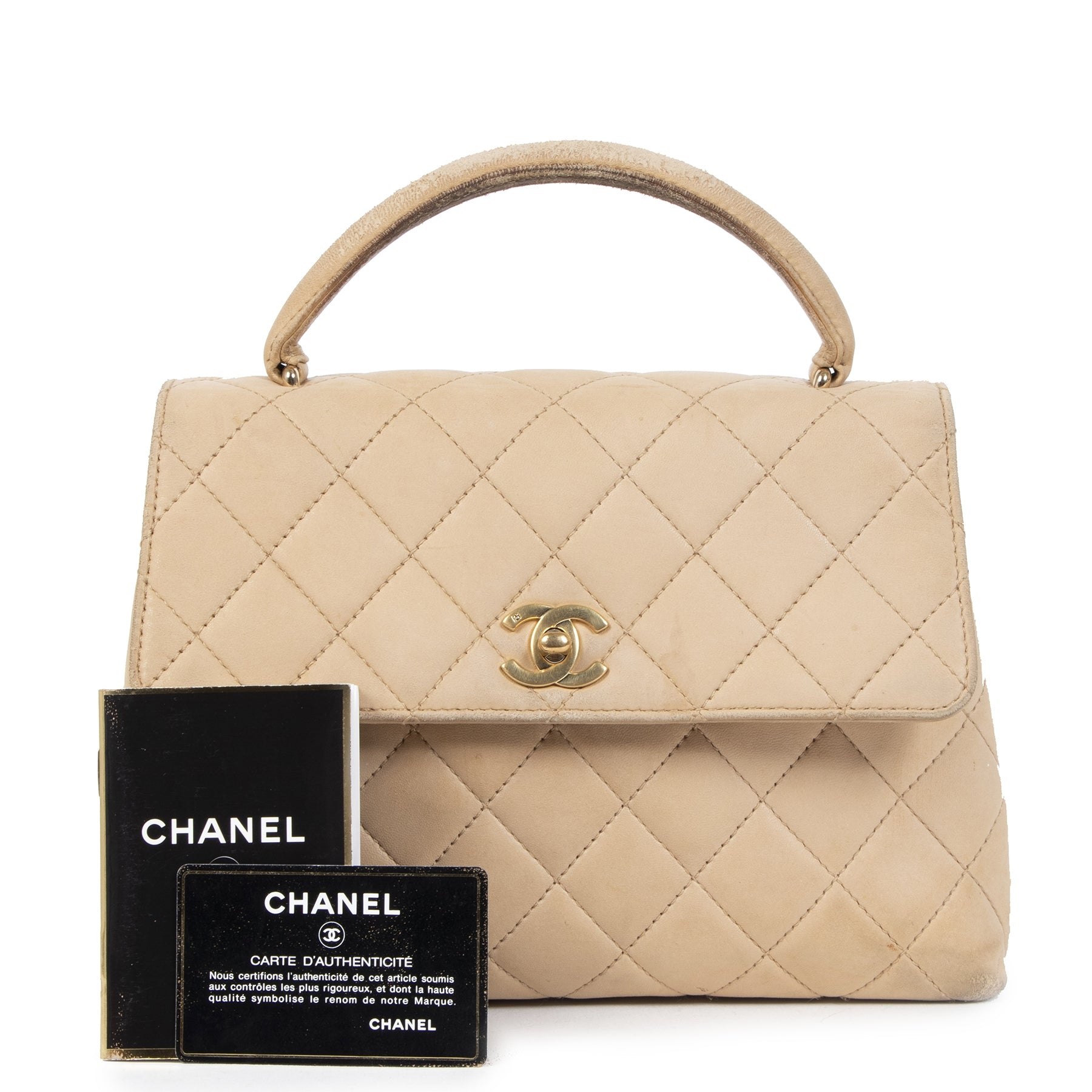 Buy authentic secondhand Chanel Nude Quilted Flap Top Handle Bag at the right price at LabelLOV vintage webshop. Safe and secure online shopping. Koop authentieke tweedehands Chanel Nude Quilted Flap Top Handle Bag met de juiste prijs bij LabelLOV