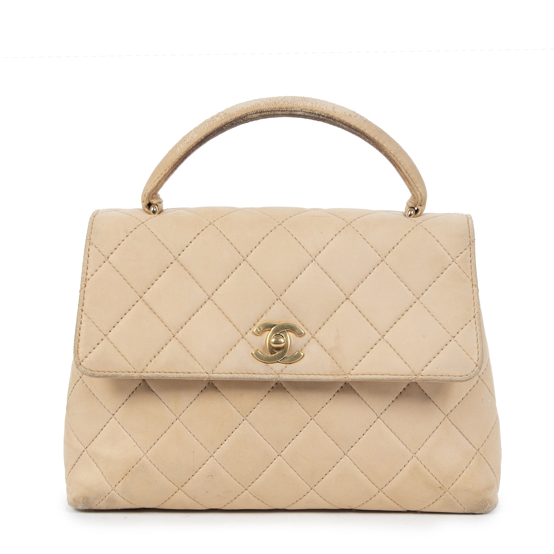 Buy authentic secondhand Chanel Nude Quilted Flap Top Handle Bag at the right price at LabelLOV vintage webshop. Safe and secure online shopping. Koop authentieke tweedehands Chanel Nude Quilted Flap Top Handle Bag met de juiste prijs bij LabelLOV