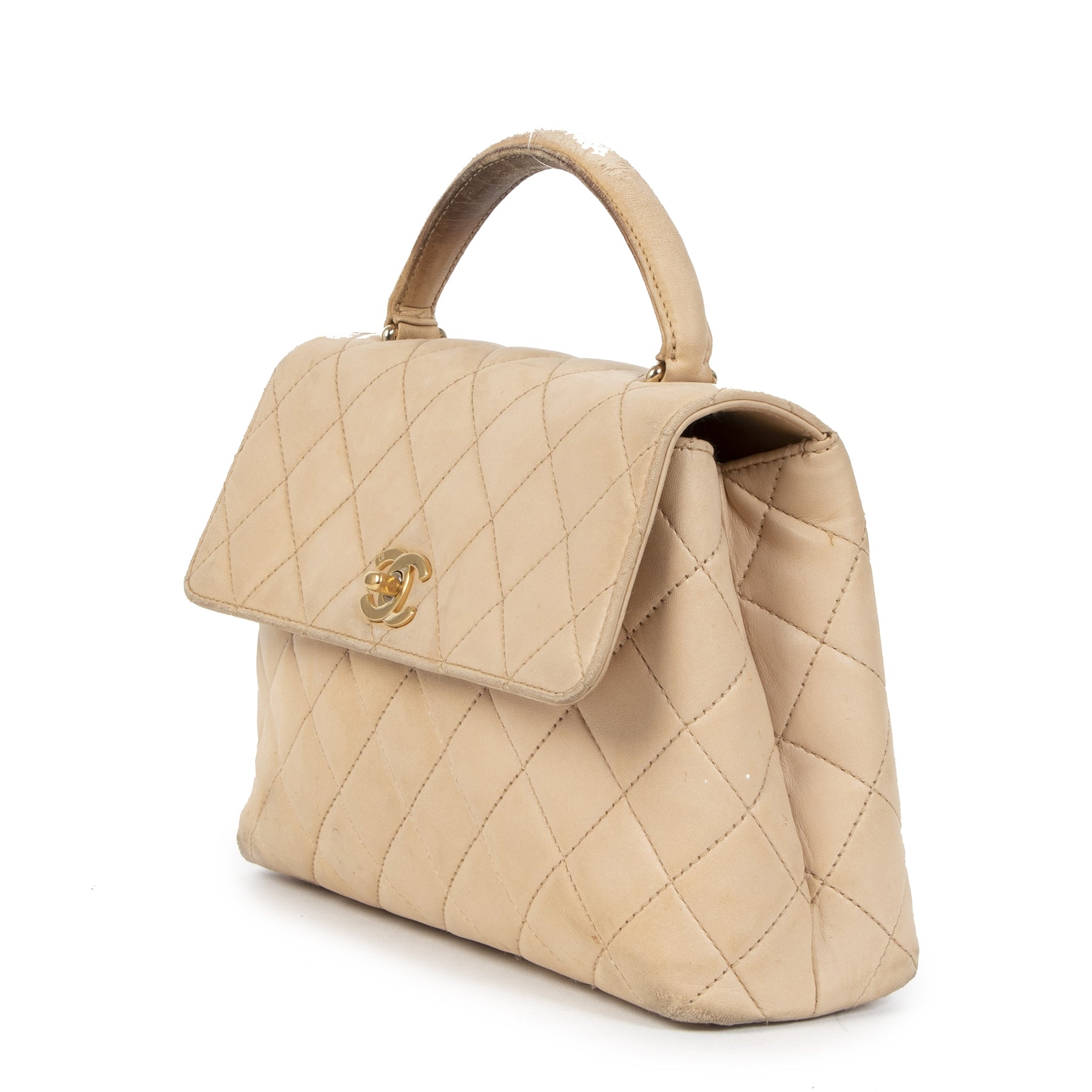 Buy authentic secondhand Chanel Nude Quilted Flap Top Handle Bag at the right price at LabelLOV vintage webshop. Safe and secure online shopping. Koop authentieke tweedehands Chanel Nude Quilted Flap Top Handle Bag met de juiste prijs bij LabelLOV