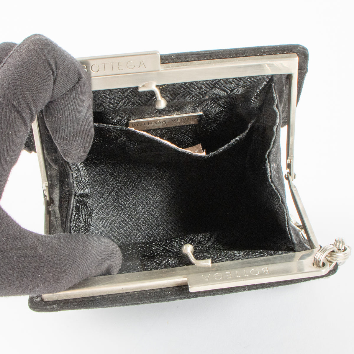 Shop the 100% authentic Bottega Veneta Vintage Black Suede Chain Clutch second hand on Labellov.com!