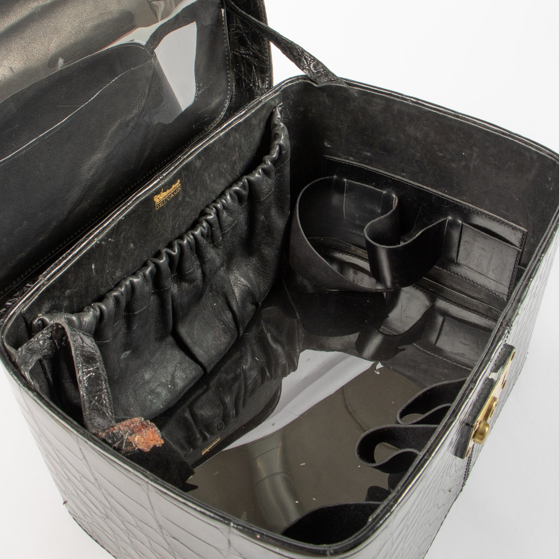 Shop the 100% authentic Delvaux Black Vintage Shiny Crocodile Beauty Case second hand on Labellov.com