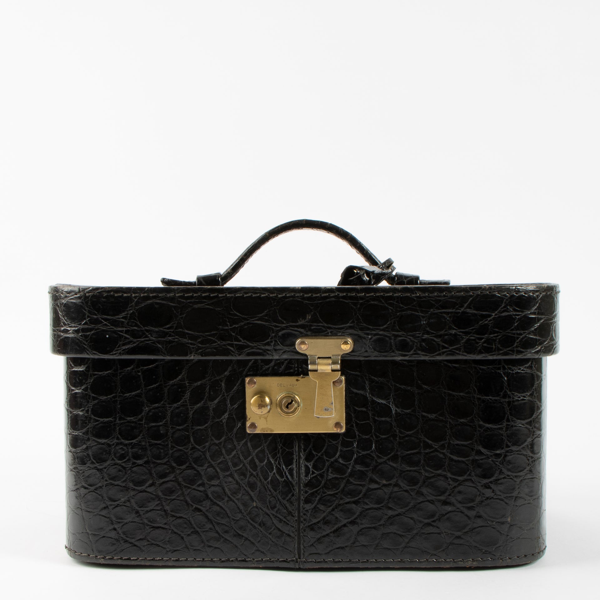 Shop the 100% authentic Delvaux Black Vintage Shiny Crocodile Beauty Case second hand on Labellov.com