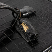 Shop the 100% authentic Delvaux Black Vintage Shiny Crocodile Beauty Case second hand on Labellov.com