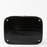 Shop the 100% authentic Delvaux Black Vintage Shiny Crocodile Beauty Case second hand on Labellov.com