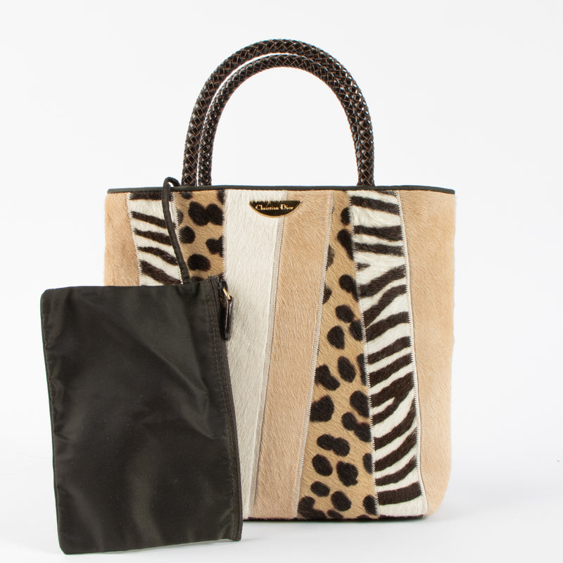 Shop the 100% authentic Christian Dior Patchwork Pony Hair Small Tote Bag second hand on Labellov.com!