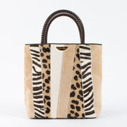 Shop the 100% authentic Christian Dior Patchwork Pony Hair Small Tote Bag second hand on Labellov.com!