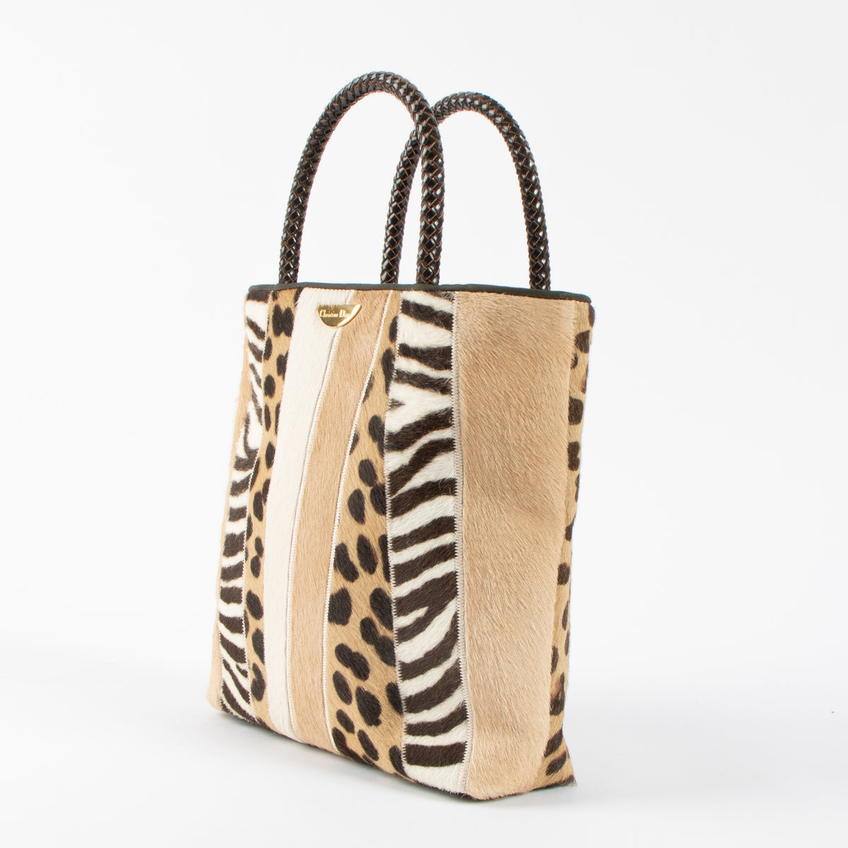 Shop the 100% authentic Christian Dior Patchwork Pony Hair Small Tote Bag second hand on Labellov.com!