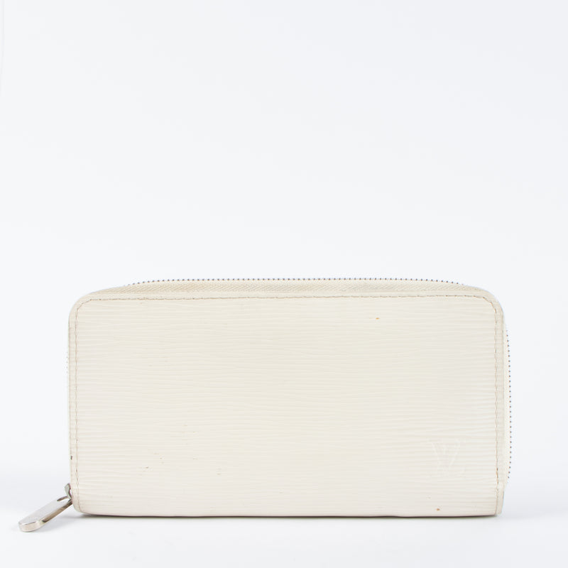 Shop the 100% authentic Louis Vuitton Ivoire Epi Zippy Wallet second hand on Labellov.com!