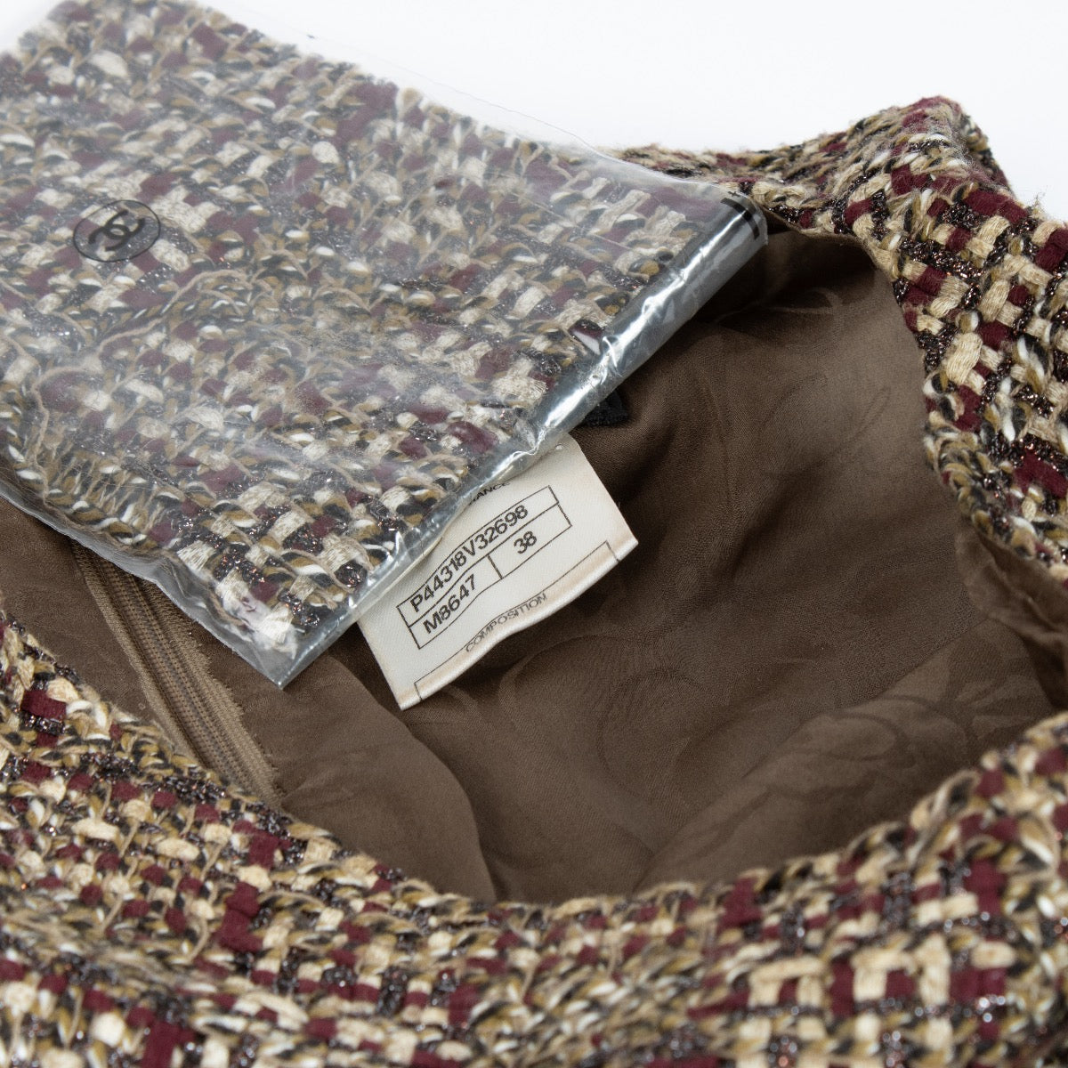 shop 100% authentic second hand Chanel 12A Brown Tweed Dress - Size 38 on Labellov.com