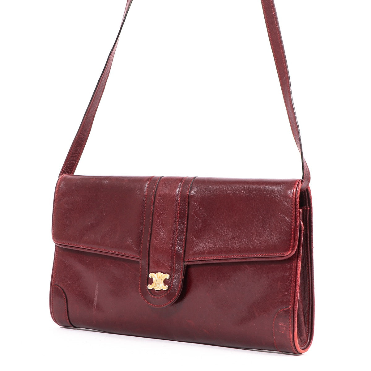 Shop safe online at Labellov in Antwerp this 100% authentic second hand Celine Burgundy Triomphe Vintage Shoulder Bag