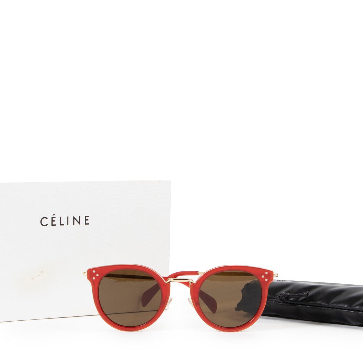 Koop een authentieke tweedehands Céline zonnebril in het rood.