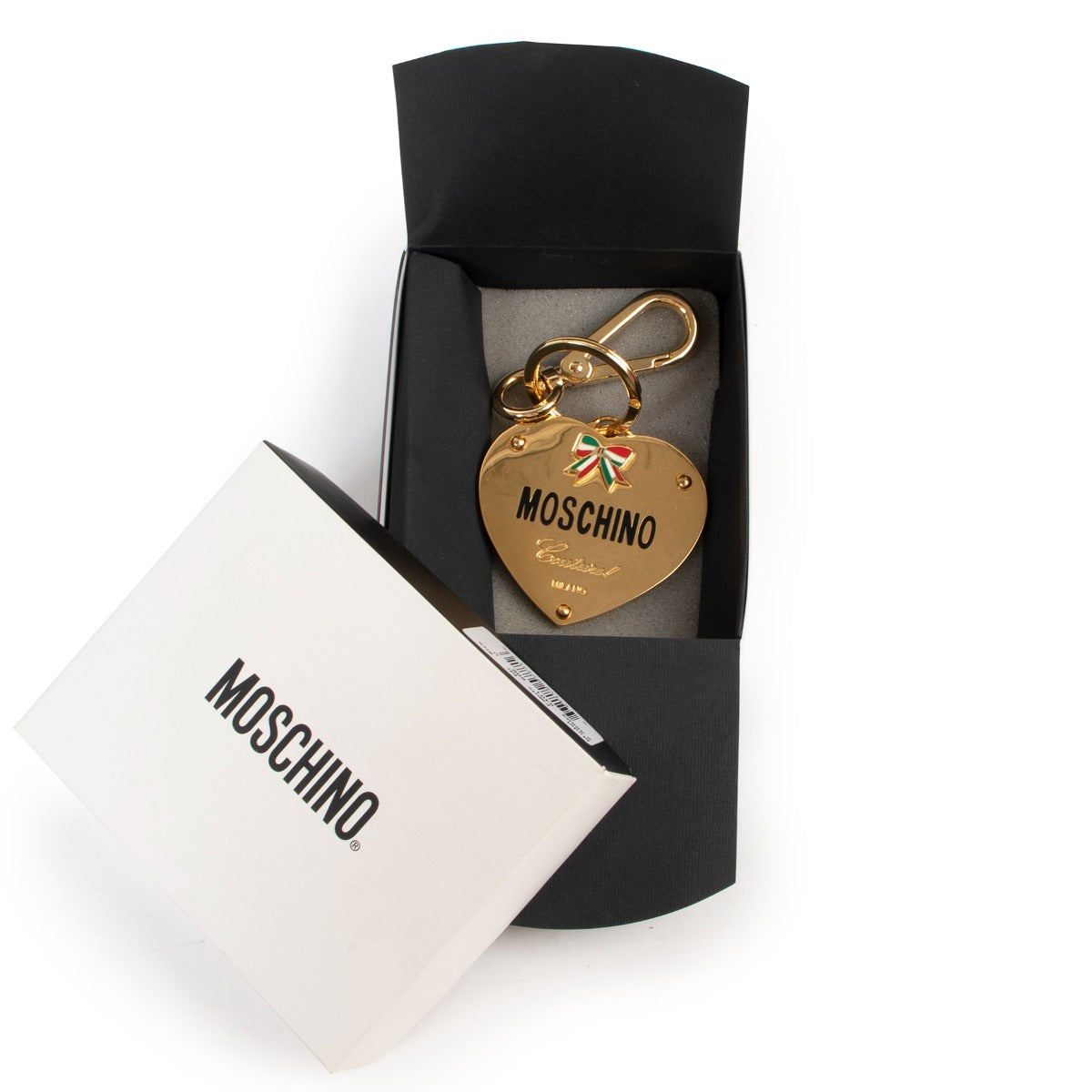 Buy second hand high-end designer fashion Moschino Gold Heart Keychain Bag Charm at Labellov.