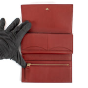 Shop safe online at Labellov in Antwerp, Brussels and Knokke this 100% authentic second hand Delvaux Red Leather Long Wallet