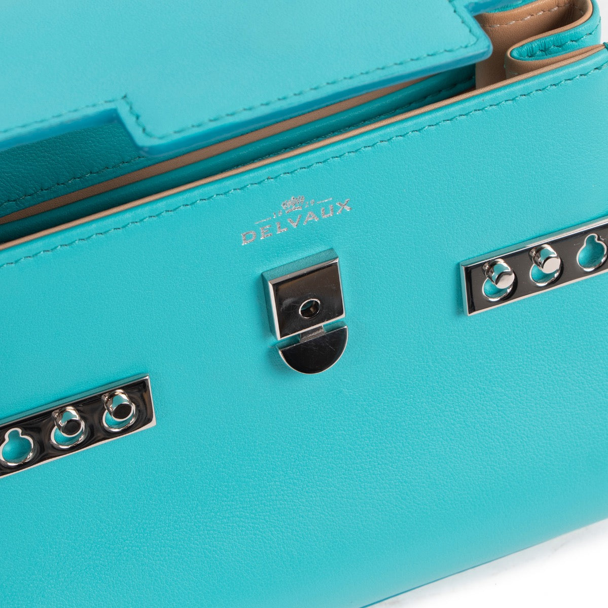 Buy online an authentic second hand Delvaux turquoise Tempête micro crossbody bag in very good condition at Labellov in Antwerp.