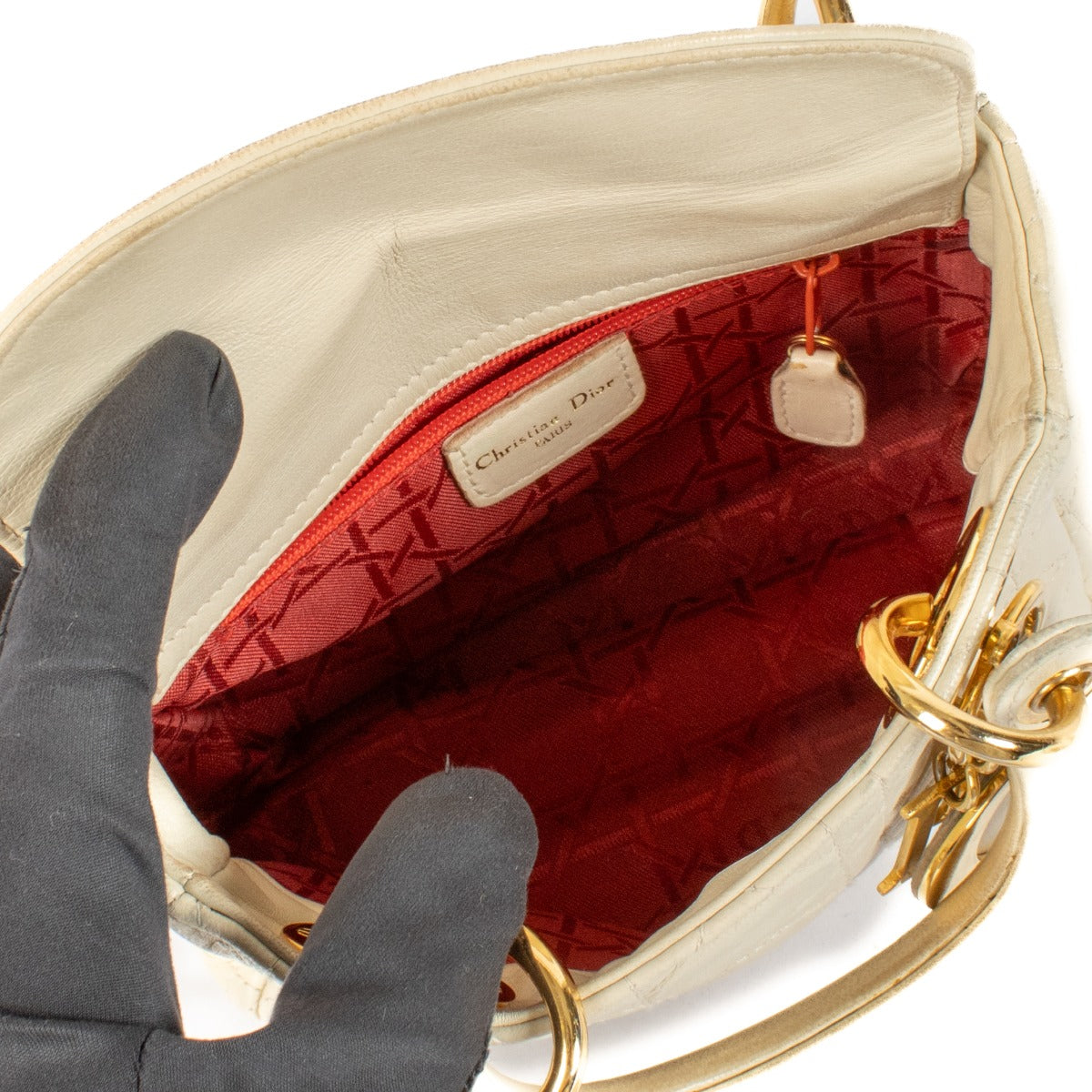 Shop 100% authentic Christian Dior Cream Lambskin Cannage Mini Lady Dior Bag at Labellov.com.