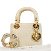 Shop 100% authentic Christian Dior Cream Lambskin Cannage Mini Lady Dior Bag at Labellov.com.