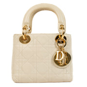 Shop 100% authentic Christian Dior Cream Lambskin Cannage Mini Lady Dior Bag at Labellov.com.