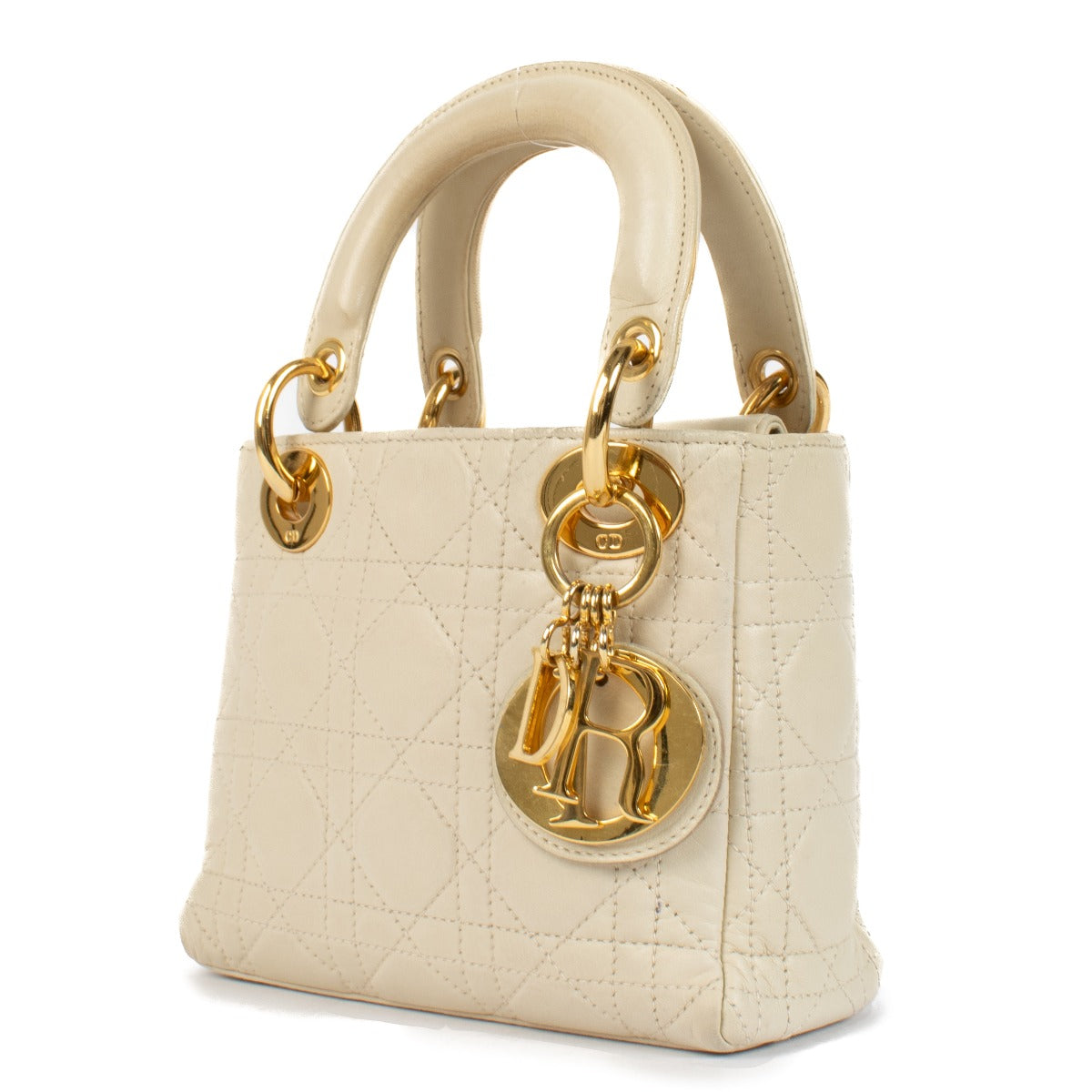Shop 100% authentic Christian Dior Cream Lambskin Cannage Mini Lady Dior Bag at Labellov.com.