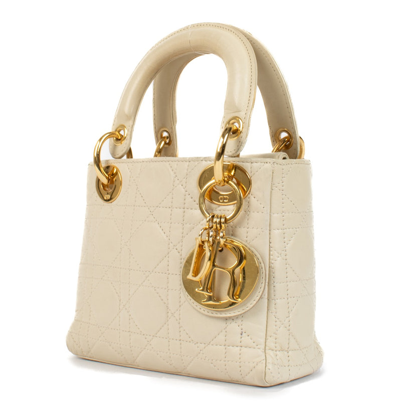 Shop 100% authentic Christian Dior Cream Lambskin Cannage Mini Lady Dior Bag at Labellov.com.