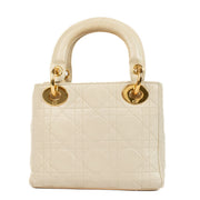 Shop 100% authentic Christian Dior Cream Lambskin Cannage Mini Lady Dior Bag at Labellov.com.