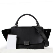 Shop safe online at Labellov in Antwerp this 100% authentic second hand Celine Black Leather Trapeze Shoulder Bag in very good, excellent condition.
