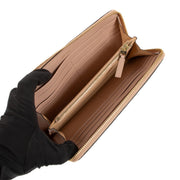Shop safe online at Labellov in Antwerp, Brussels and Knokke this 100% authentic second hand Delvaux Nude Leather Accordéon Long Wallet